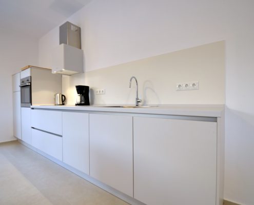 Asaya-Hills-Villas-Parga-Greece-private-villas-white-kitchen-appliances White minimal kitchen with appliances at a private villa at Asaya Hills Villas, Parga, Greece.