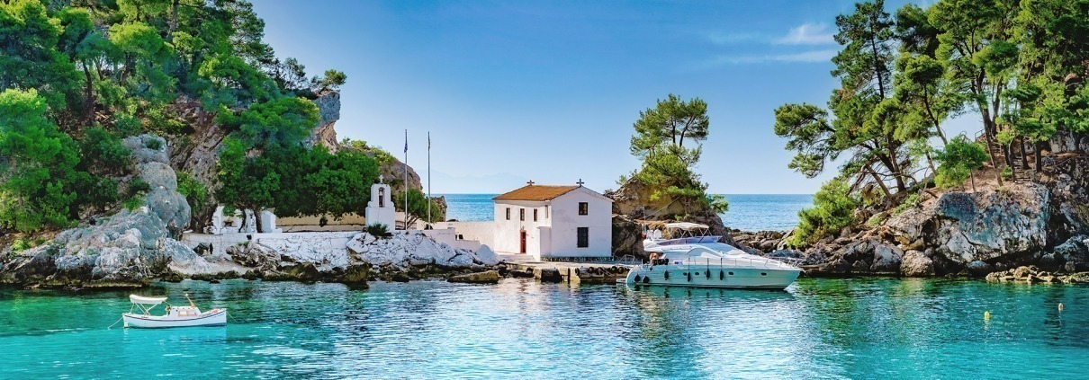 Asaya-Hills-Villas-Parga-Greece-Island-of-Panagia-small-chapel-blue-sea-holidays The small chapel at the island of Panagia, surrounded by the crystal blue sea at Parga, Greece.